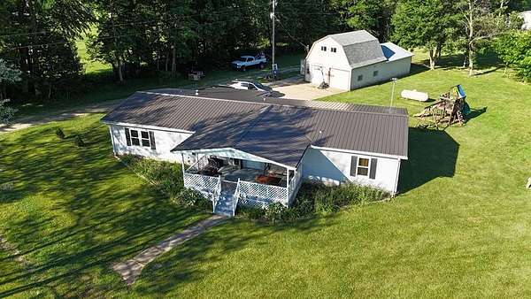 5 Acres of Land with Home for Sale in Nova, Ohio