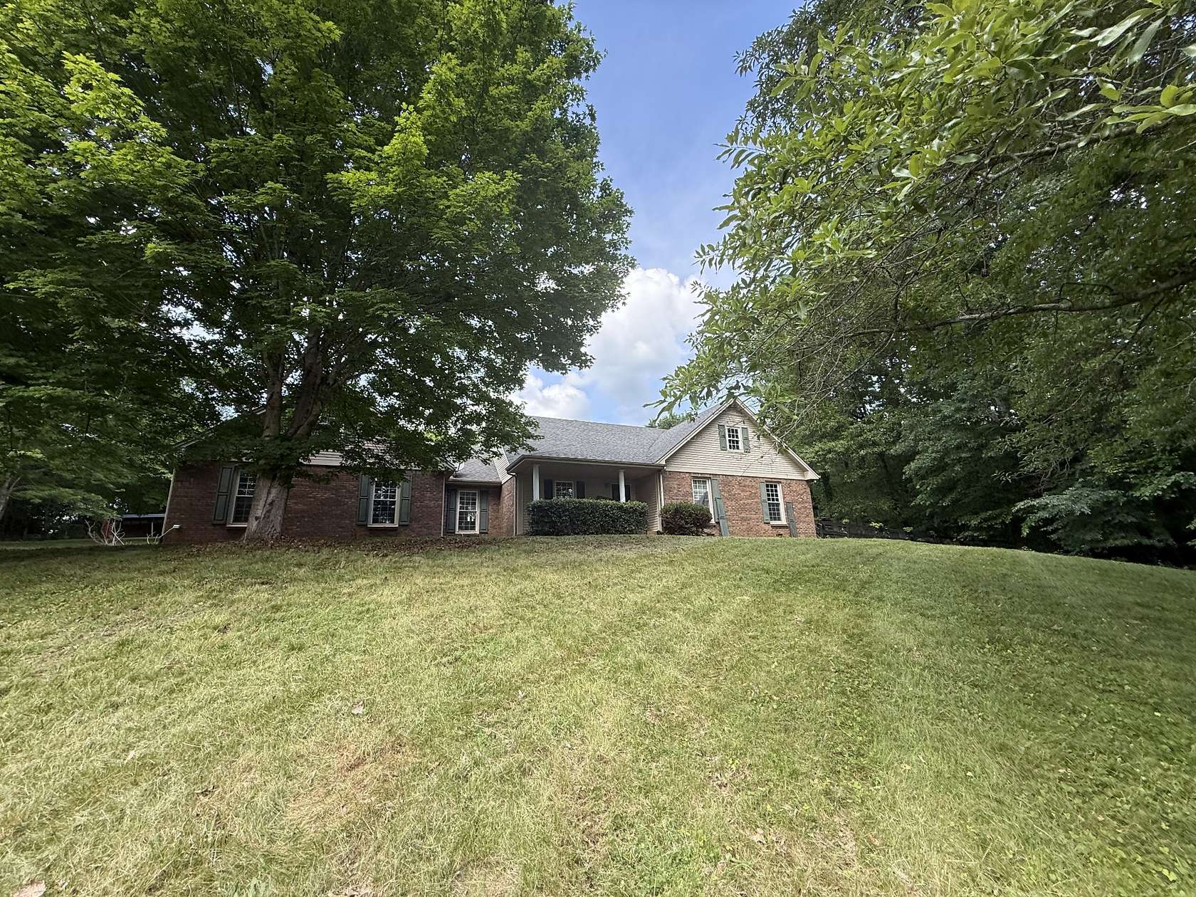 6.7 Acres of Land with Home for Sale in Woodlawn, Tennessee