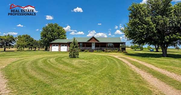 7 Acres of Land with Home for Sale in Dodge City, Kansas