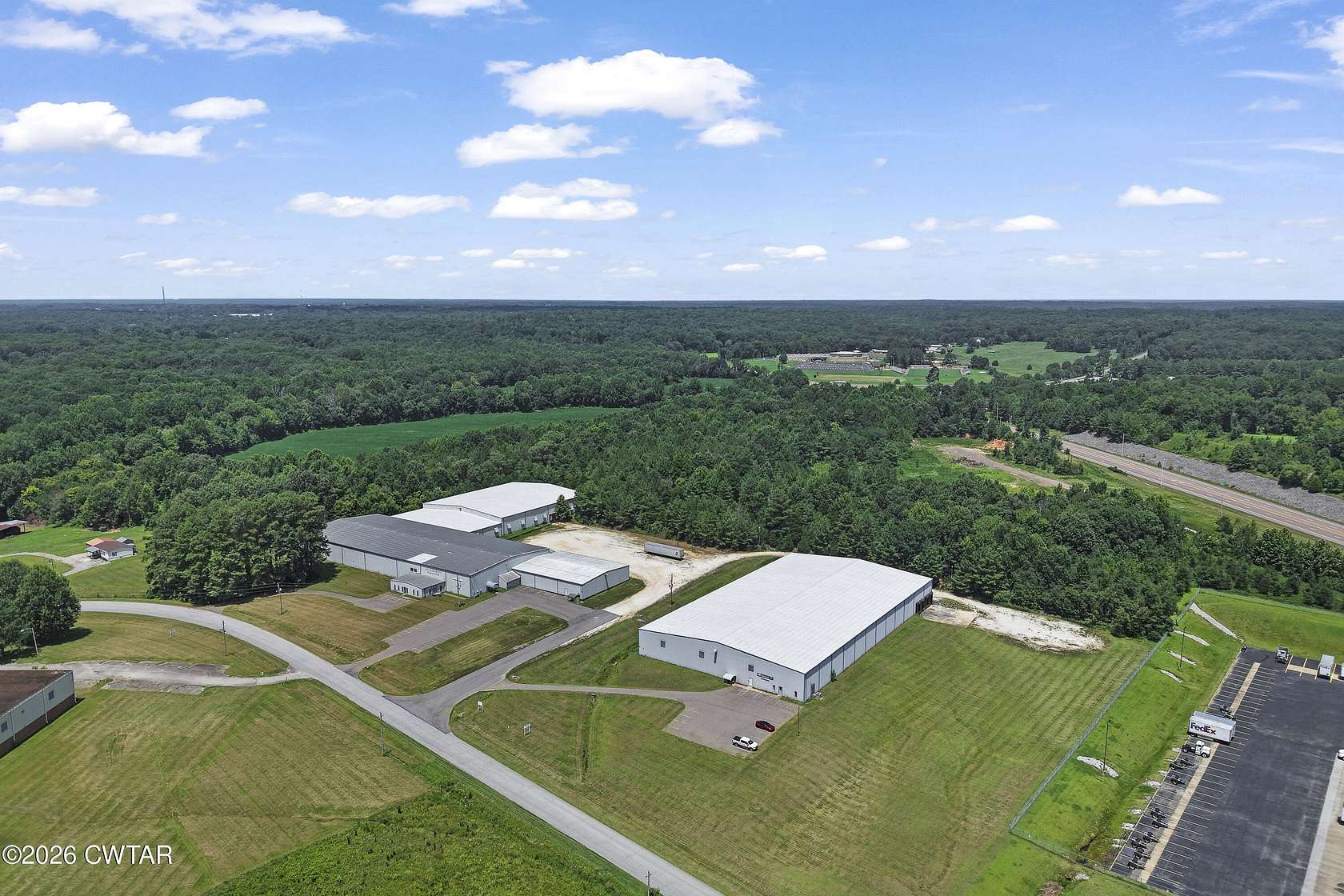 11.7 Acres of Improved Commercial Land for Sale in Dresden, Tennessee