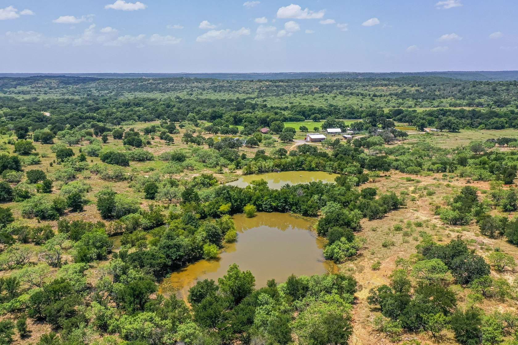 100 Acres of Agricultural Land with Home for Sale in Jacksboro, Texas