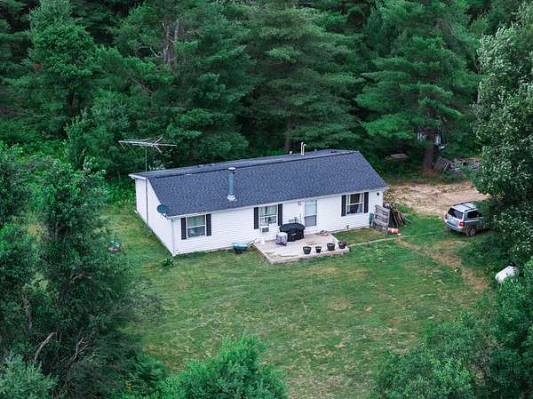 14.4 Acres of Recreational Land with Home for Sale in Gaylord, Michigan