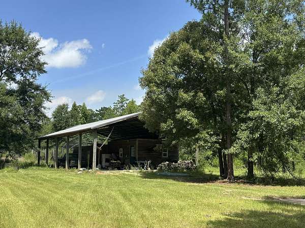 6 Acres of Land with Home for Sale in Baker, Florida