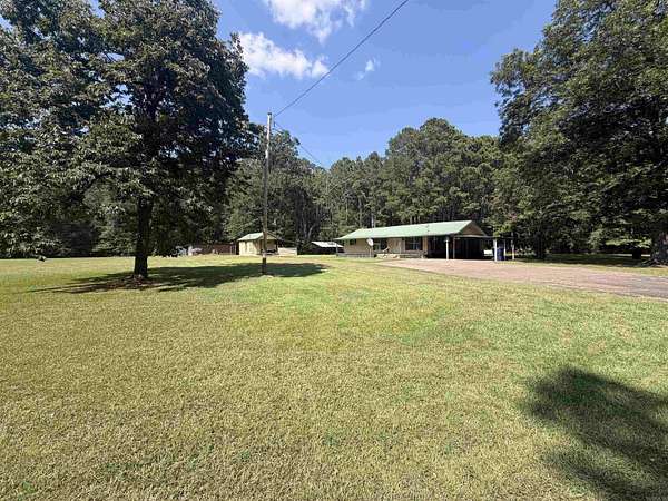 10.3 Acres of Land with Home for Sale in El Dorado, Arkansas