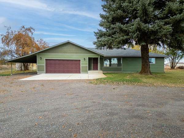 9.77 Acres of Land with Home for Sale in Deer Park, Washington