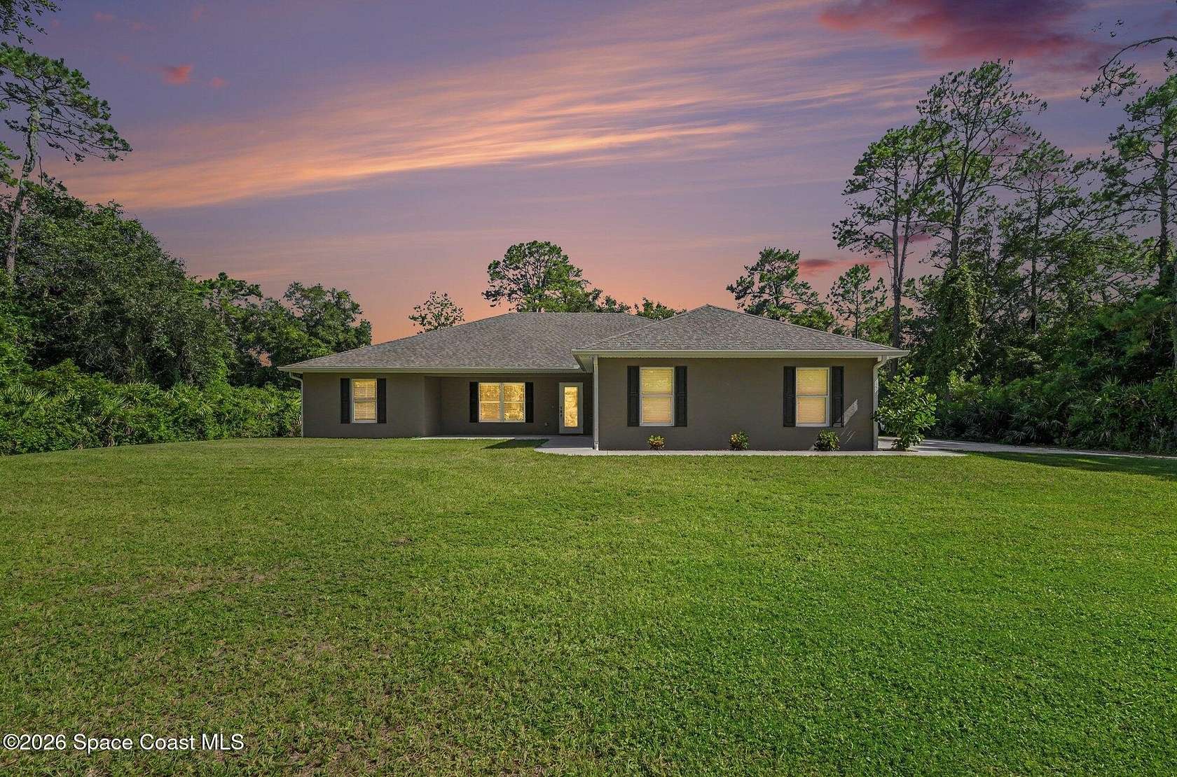 2 Acres of Land with Home for Sale in Mims, Florida