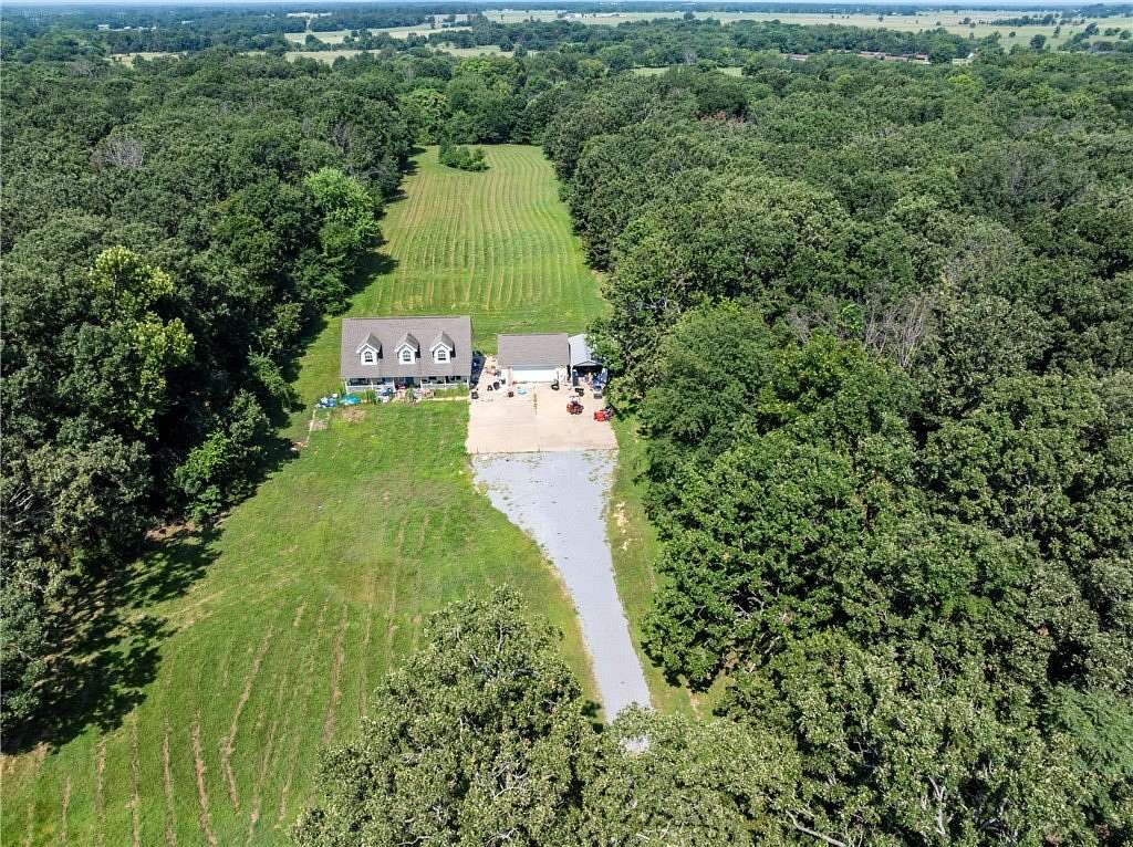 8.4 Acres of Land with Home for Sale in Gentry, Arkansas