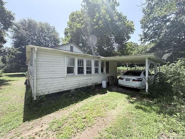 8.26 Acres of Land with Home for Sale in Heavener, Oklahoma