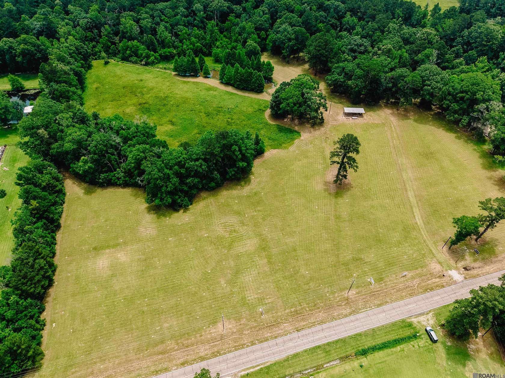 2.76 Acres of Land with Home for Sale in Zachary, Louisiana