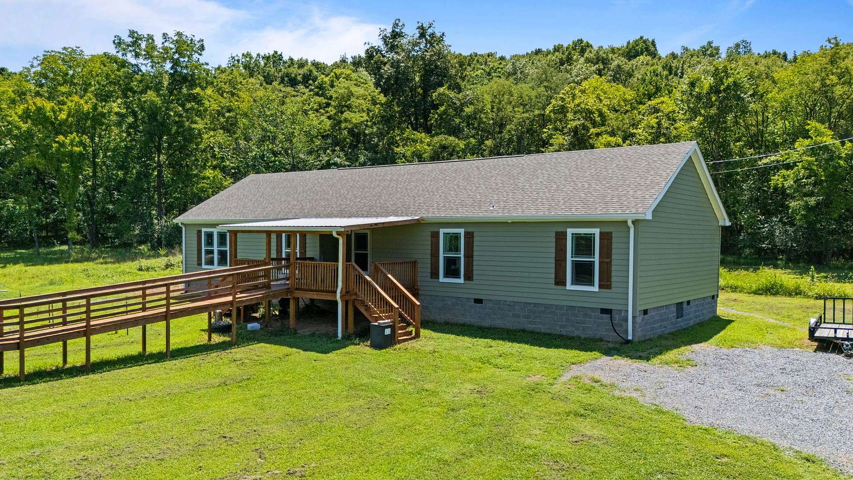 15.6 Acres of Land with Home for Sale in Hartsville, Tennessee