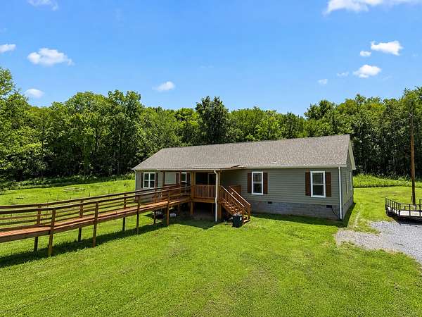 15.6 Acres of Land with Home for Sale in Hartsville, Tennessee