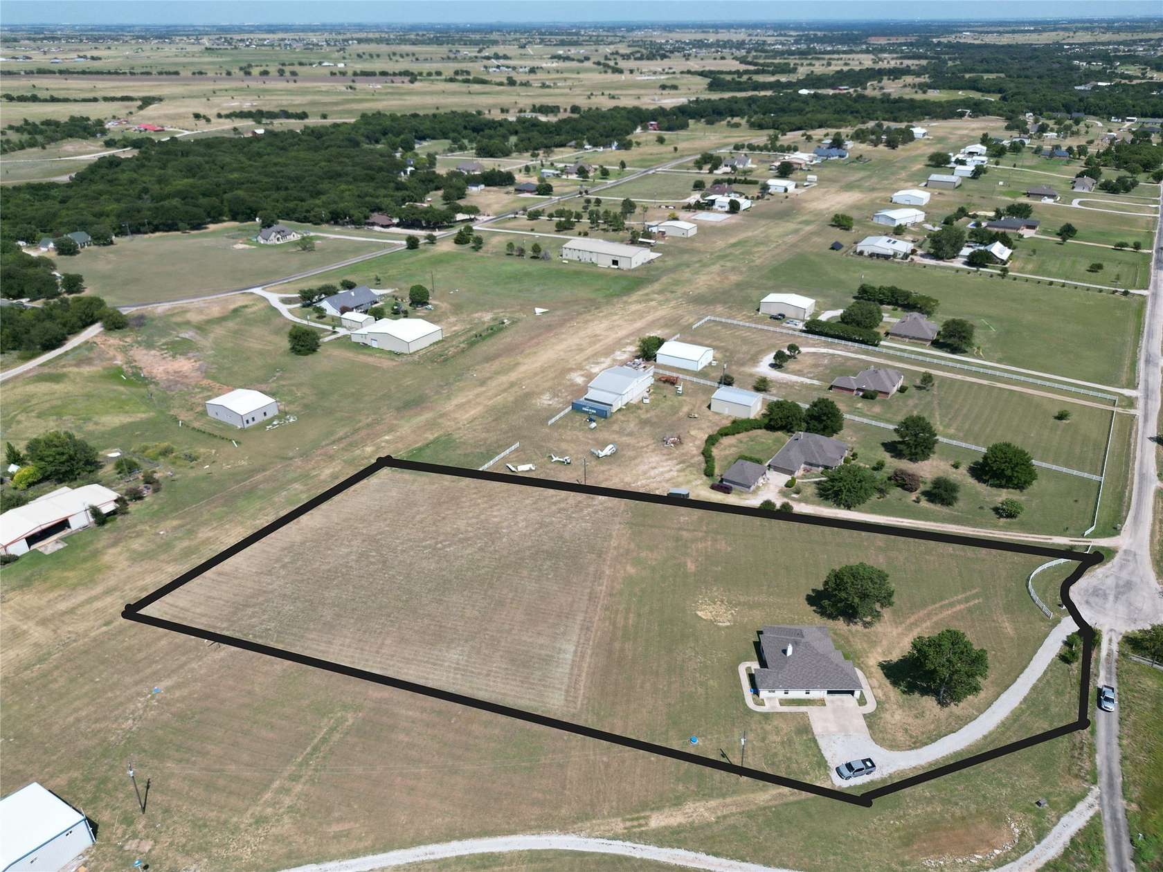 3 Acres of Land with Home for Sale in Rhome, Texas