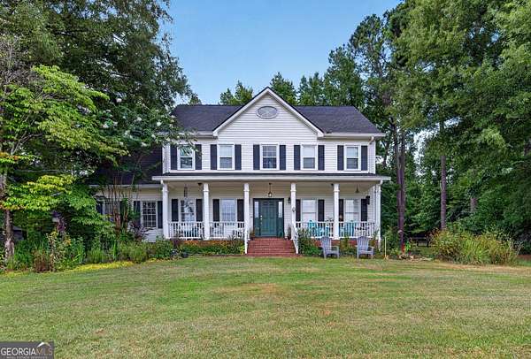 11.2 Acres of Land with Home for Sale in Brooks, Georgia