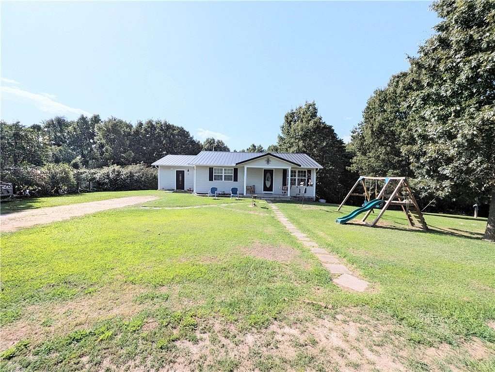 3.5 Acres of Land with Home for Sale in Harrison, Arkansas