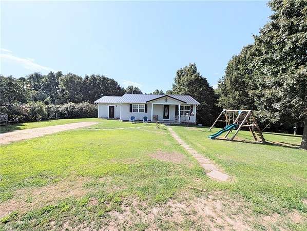 3.5 Acres of Land with Home for Sale in Harrison, Arkansas