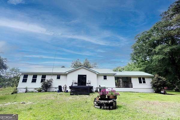 11.6 Acres of Land with Home for Sale in Jackson, Georgia