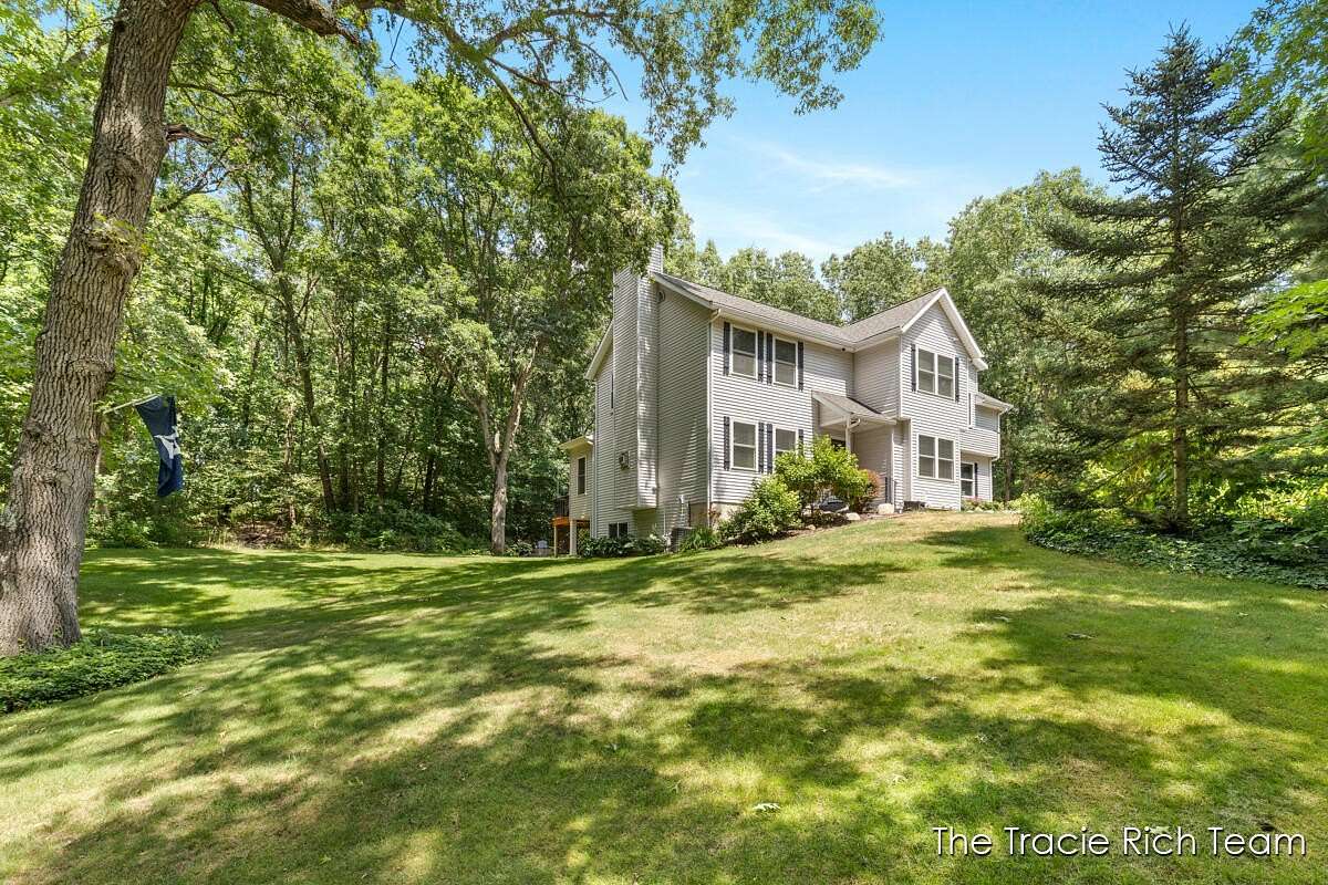 1.74 Acres of Land with Home for Sale in Rockford, Michigan