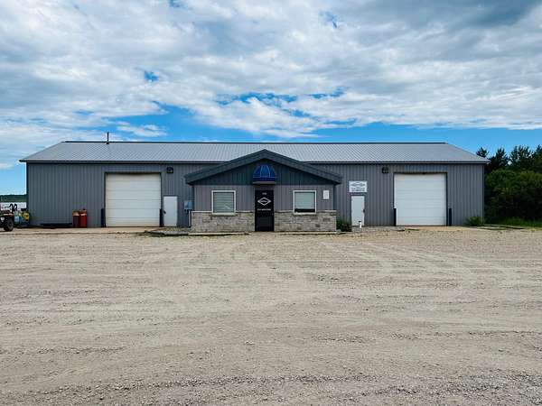 1.8 Acres of Improved Commercial Land for Sale in Cadillac, Michigan