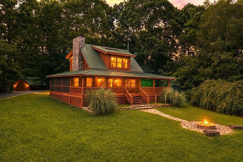 135 Acres of Land with Home for Sale in Ellijay, Georgia