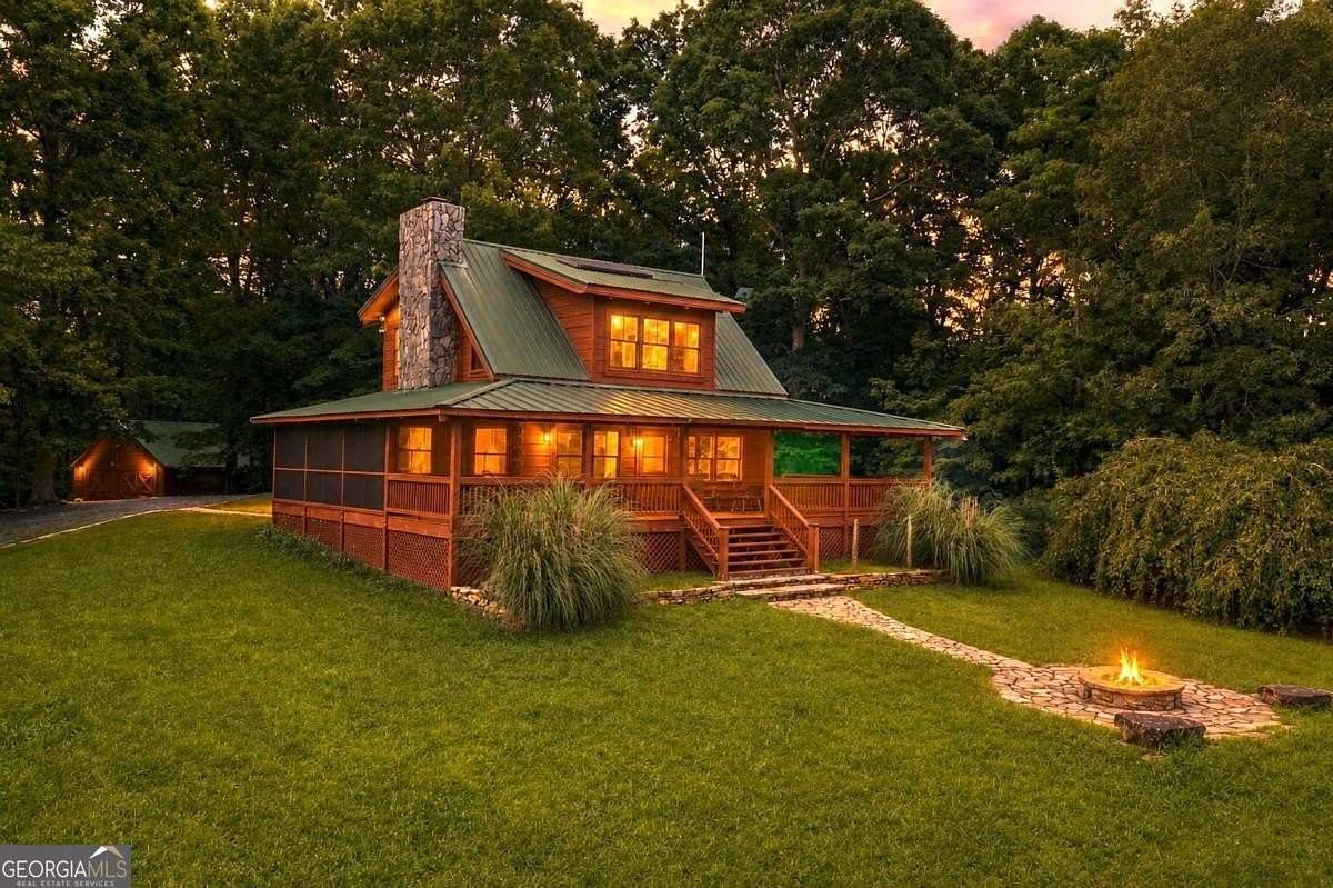 135 Acres of Land with Home for Sale in Ellijay, Georgia