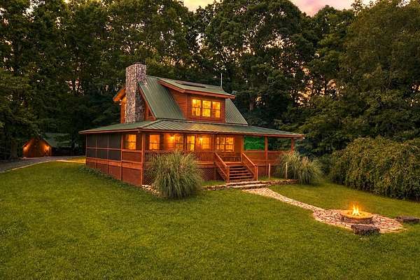 135 Acres of Land with Home for Sale in Ellijay, Georgia