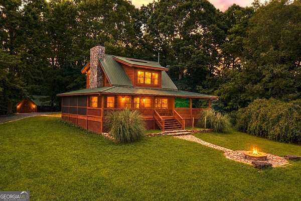 135 Acres of Land with Home for Sale in Ellijay, Georgia