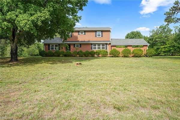 3 Acres of Land with Home for Sale in Gibsonville, North Carolina
