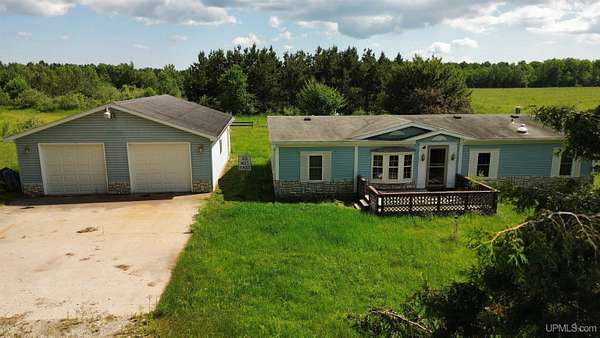 9.75 Acres of Land with Home for Sale in Cooks, Michigan