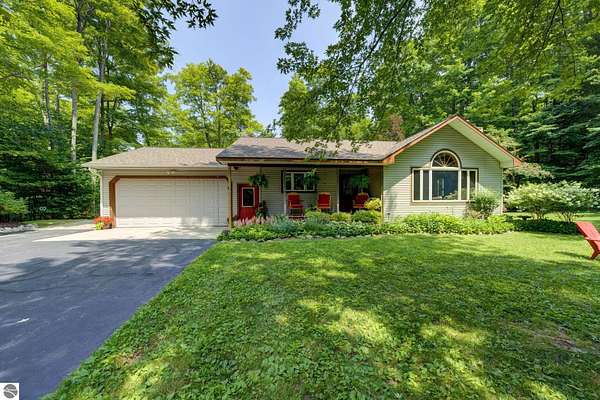 4 Acres of Land with Home for Sale in Maple City, Michigan