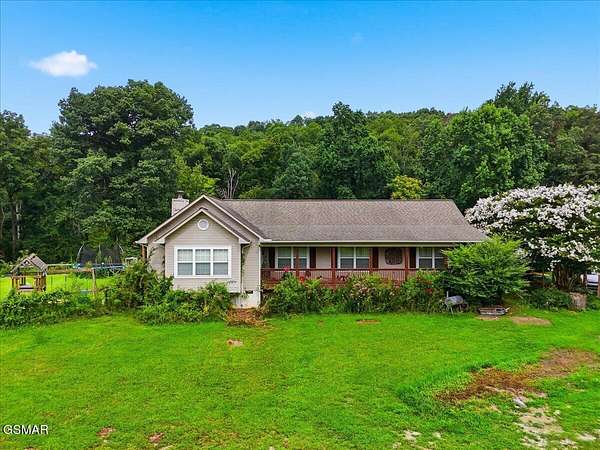 11.6 Acres of Land with Home for Sale in Dandridge, Tennessee