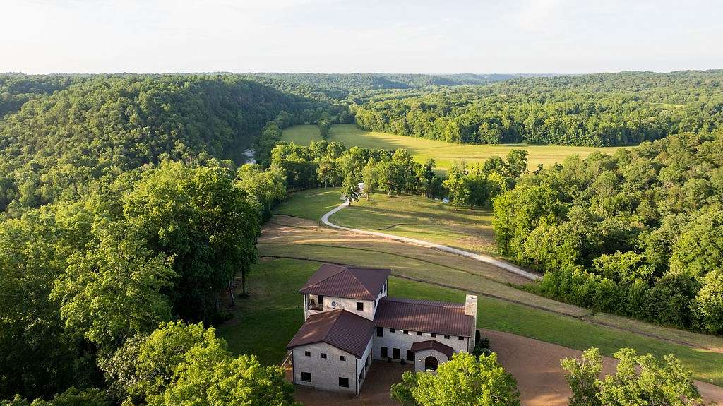 162 Acres of Land with Home for Sale in Charlotte, Tennessee