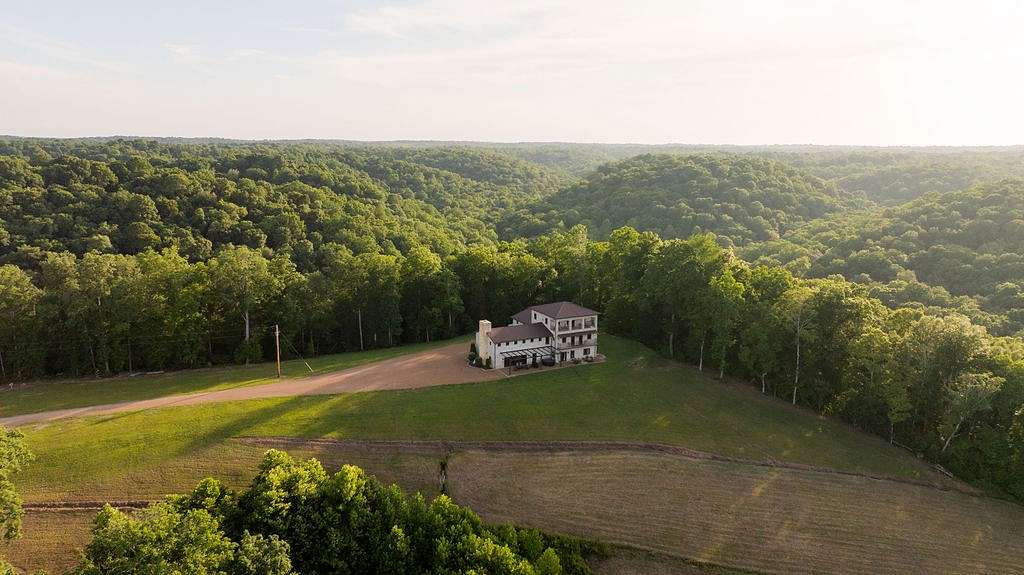 162 Acres of Land with Home for Sale in Charlotte, Tennessee