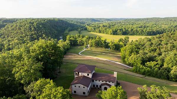 162 Acres of Land with Home for Sale in Charlotte, Tennessee