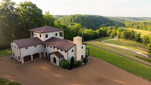 162 Acres of Land with Home for Sale in Charlotte, Tennessee