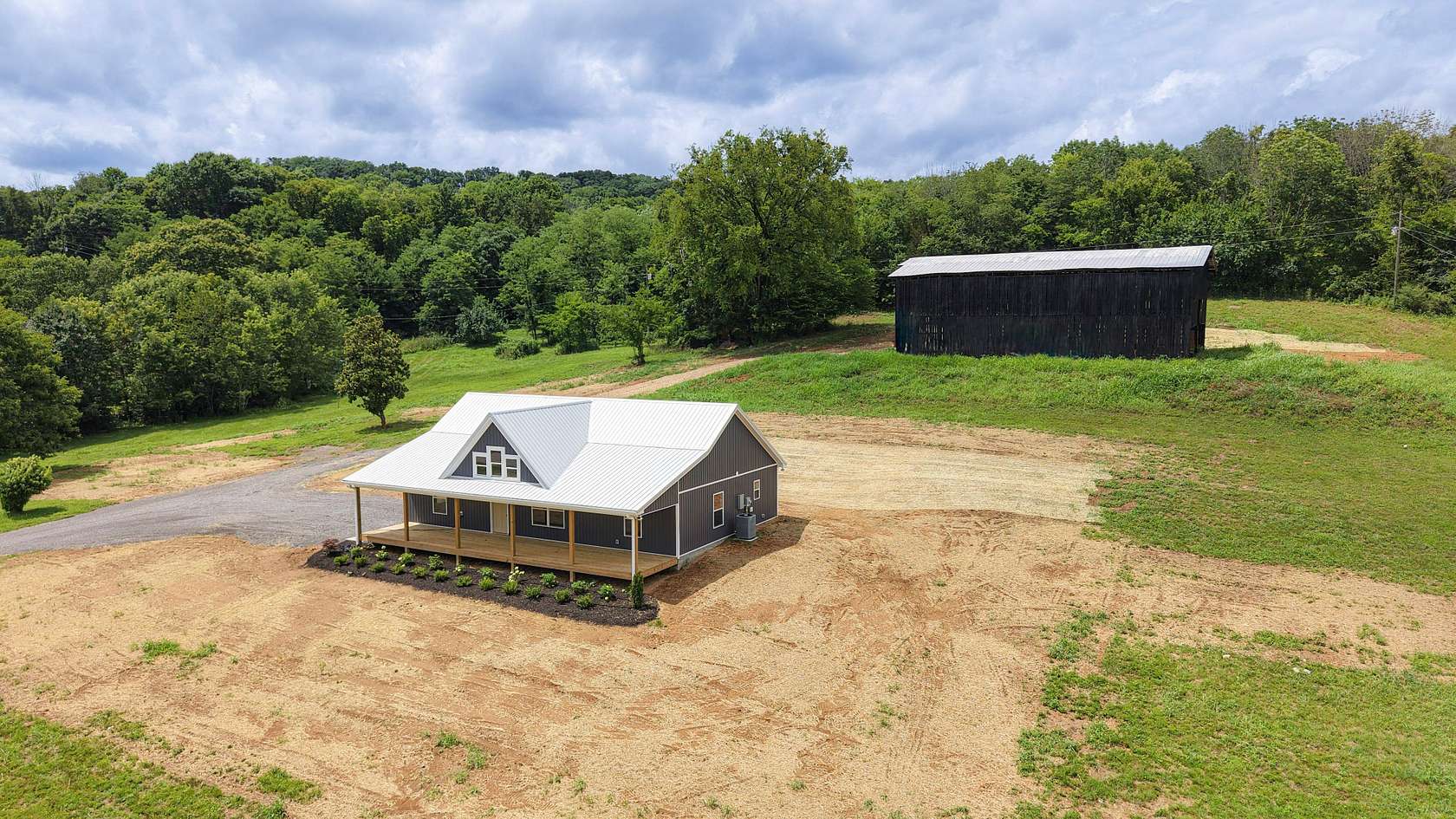 5 Acres of Land with Home for Sale in Bethpage, Tennessee