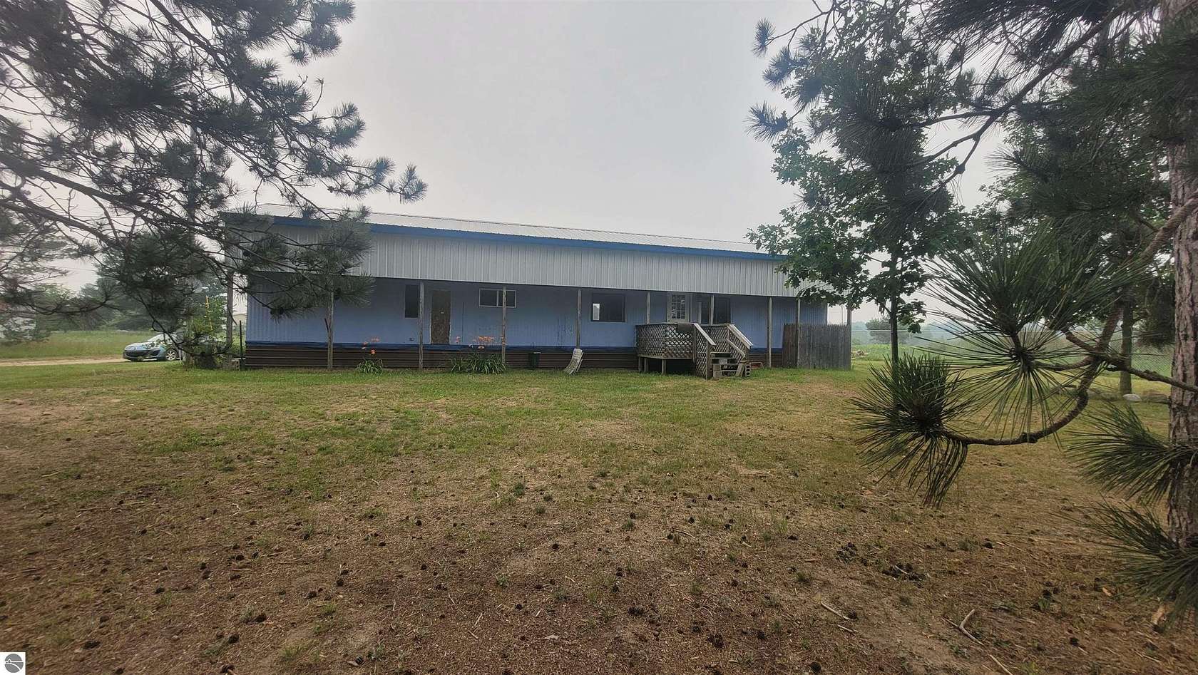 2 Acres of Land with Home for Sale in South Boardman, Michigan