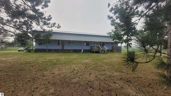 2 Acres of Land with Home for Sale in South Boardman, Michigan