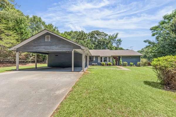 1.57 Acres of Land with Home for Sale in Conyers, Georgia