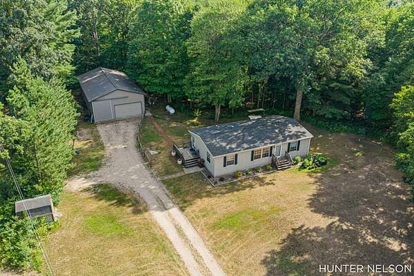 8.48 Acres of Land with Home for Sale in Cedar Springs, Michigan