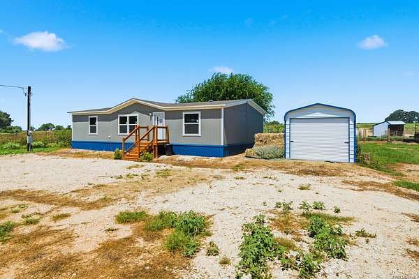 5 Acres of Land with Home for Sale in Floresville, Texas