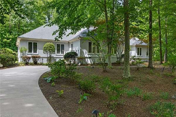 2.25 Acres of Land with Home for Sale in Summerfield, North Carolina