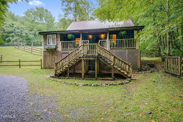 11.4 Acres of Land with Home for Sale in Roan Mountain, Tennessee