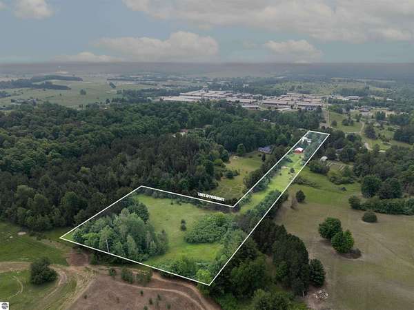 5.27 Acres of Land with Home for Sale in Williamsburg, Michigan