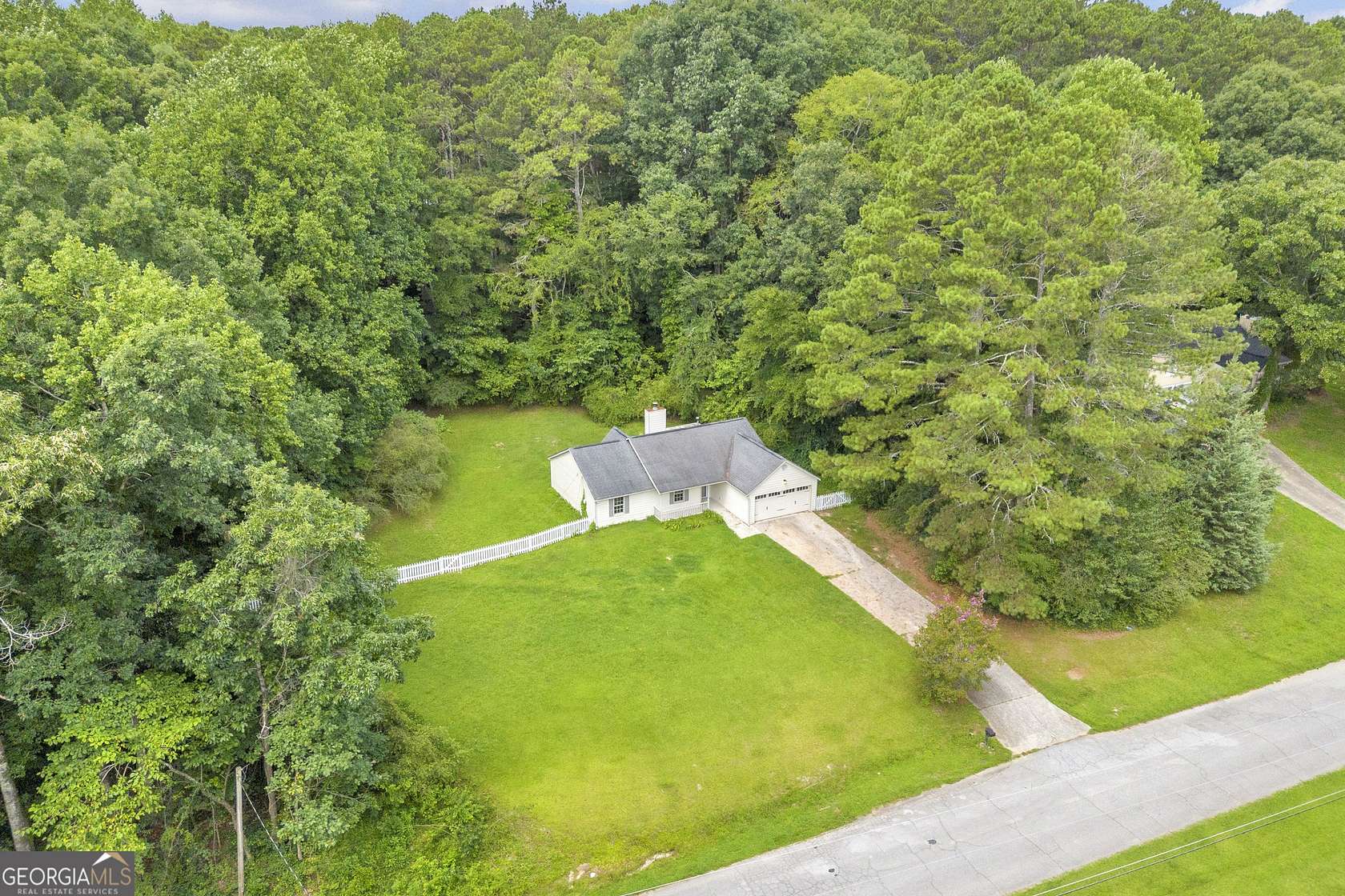 1.84 Acres of Land with Home for Sale in Loganville, Georgia