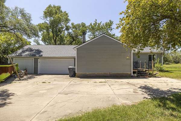4.87 Acres of Land with Home for Auction in Mulvane, Kansas