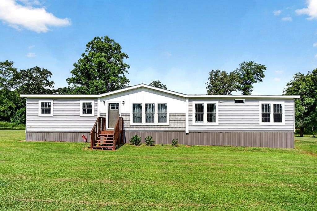 12.4 Acres of Land with Home for Sale in Poplarville, Mississippi