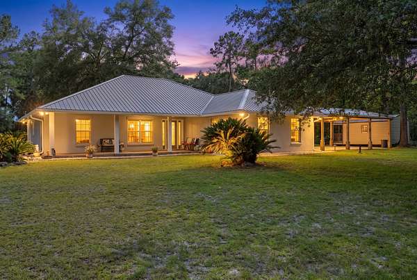 15.5 Acres of Land with Home for Sale in Live Oak, Florida