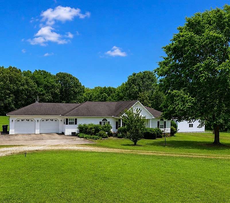 5 Acres of Land with Home for Sale in Paris, Tennessee