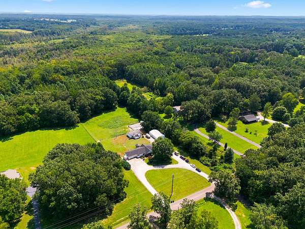 5 Acres of Land with Home for Sale in Paris, Tennessee