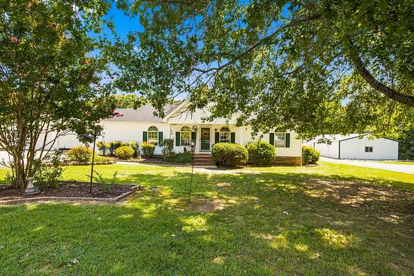 5 Acres of Land with Home for Sale in Paris, Tennessee